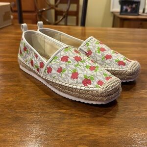 Red,green,white. MK slip on shoes great for work and nights out.